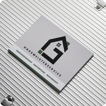 Visitenkarte für Hausmeisterservice auf Metalloberfläche, Beispiel für Printdesign und Printprodukte.